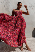 Front view of a pink pink multi pleated maxi dress, showing the neckline and bodice detail