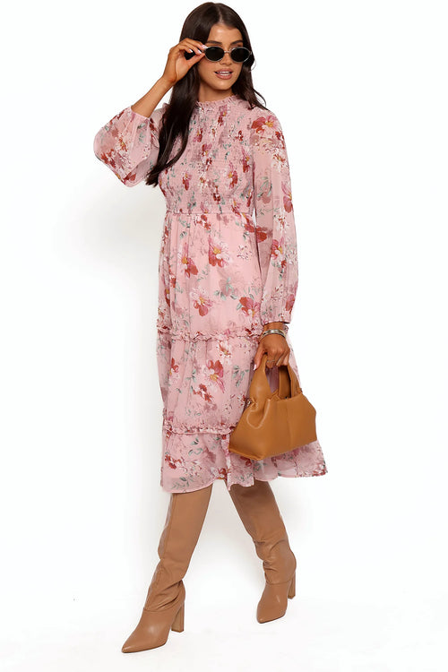Front view of a pink pink floral midi dress, sheer sleeves, showing the fabric and hem finish