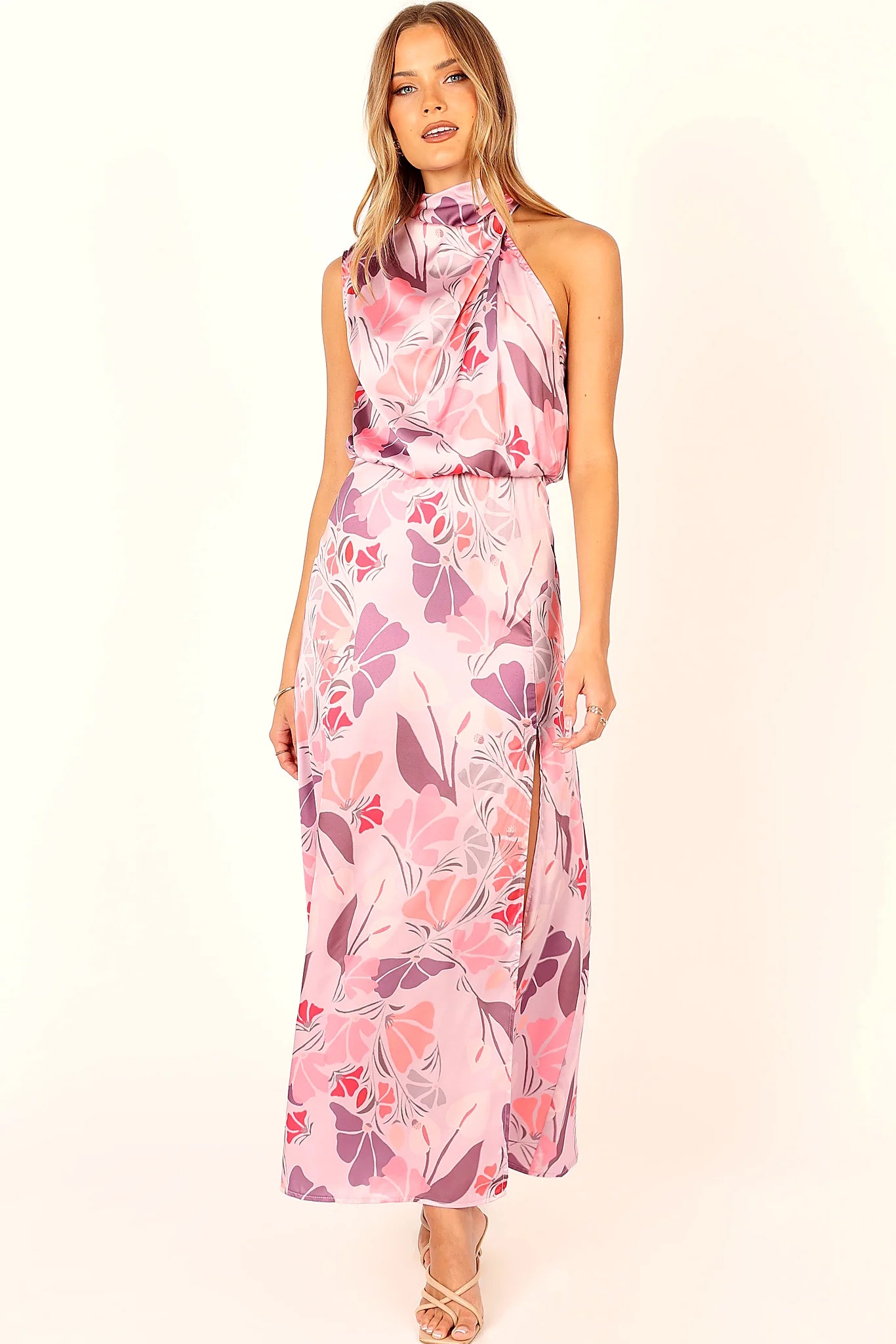Gathered pleated detail worked into an asymmetric neckline