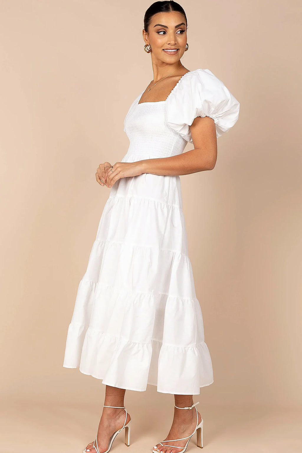 Unlined white summer dress worn with flat sandals