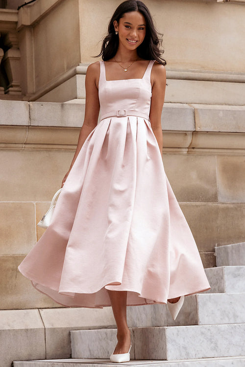 Back view of a pink dusty pink midi dress, tulle underlay, showing the fabric and hem finish