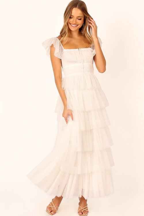 Back view of a white off white tulle maxi dress, showing the fit and drape of the skirt