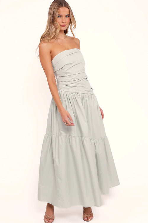 Back view of a mint strapless maxi dress, tiered skirt, showing the neckline and bodice detail