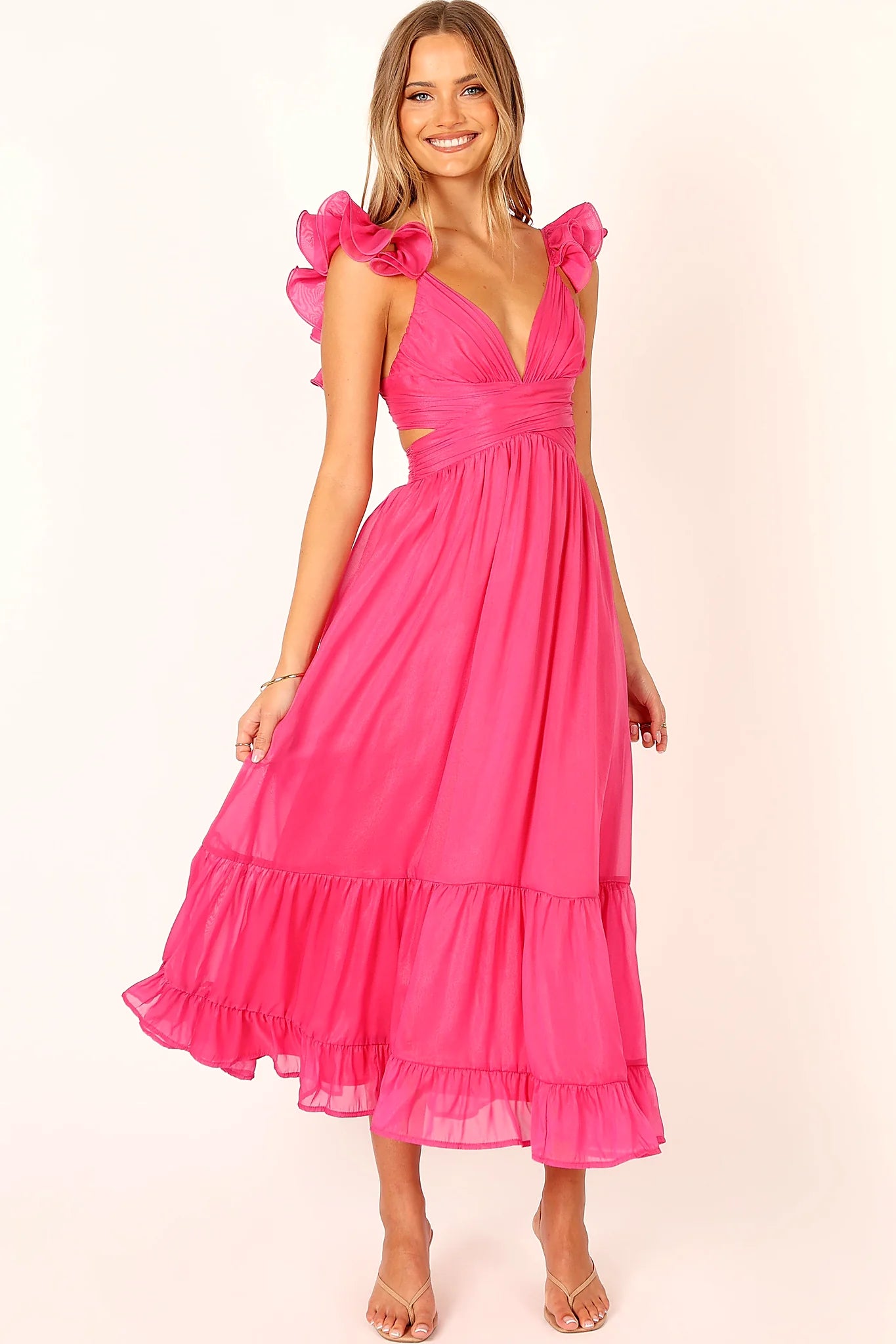 Side view of a up back berry midi dress, lace, showing the fit and drape of the skirt