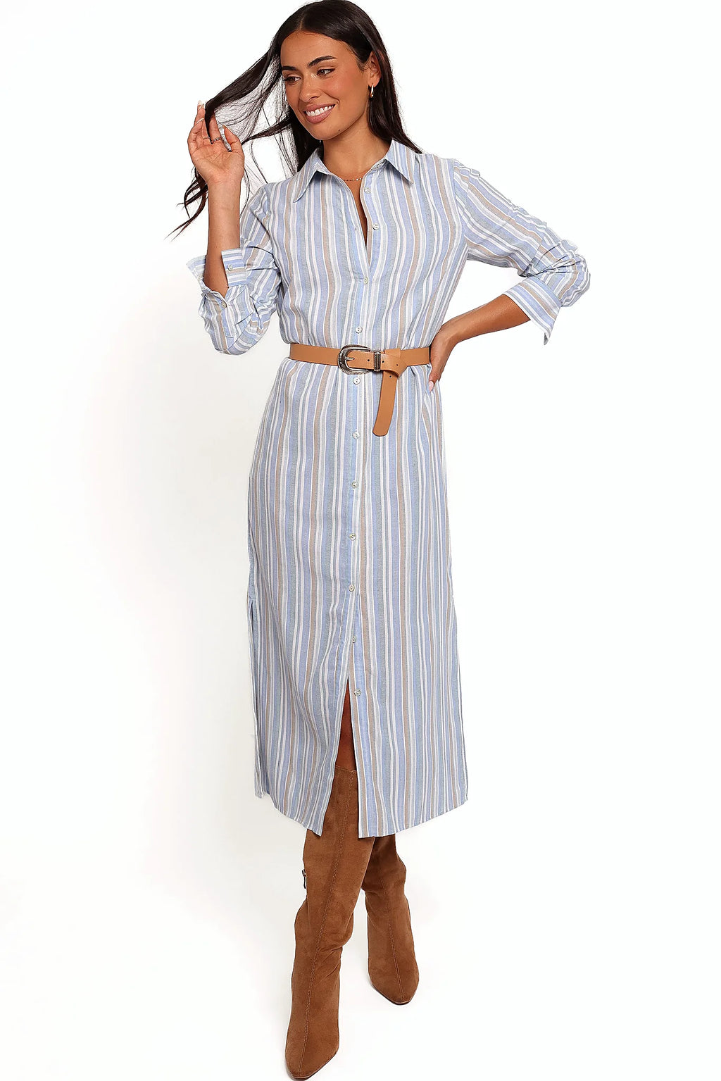 Back view of a blue blue stripe button down maxi shirt dress, showing the fabric and hem finish