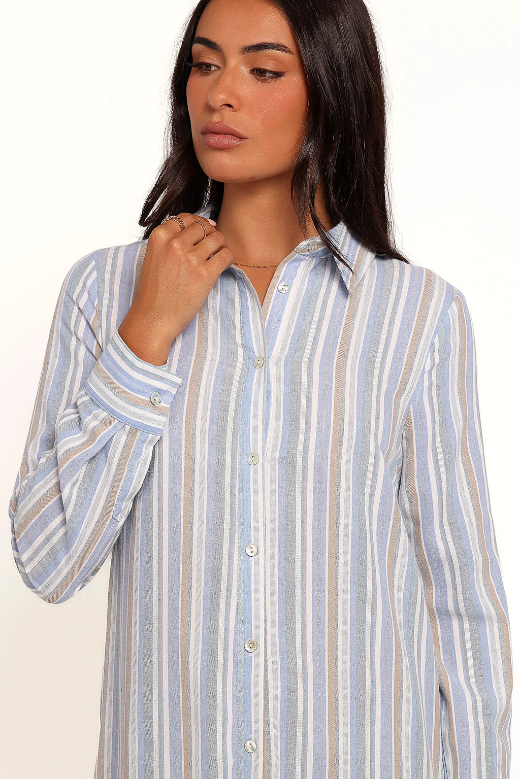 Front view of a blue blue stripe button down maxi shirt dress, showing the neckline and bodice detail
