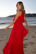 Front view of a red red halterneck maxi dress, pleated overlay, showing the neckline and bodice detail