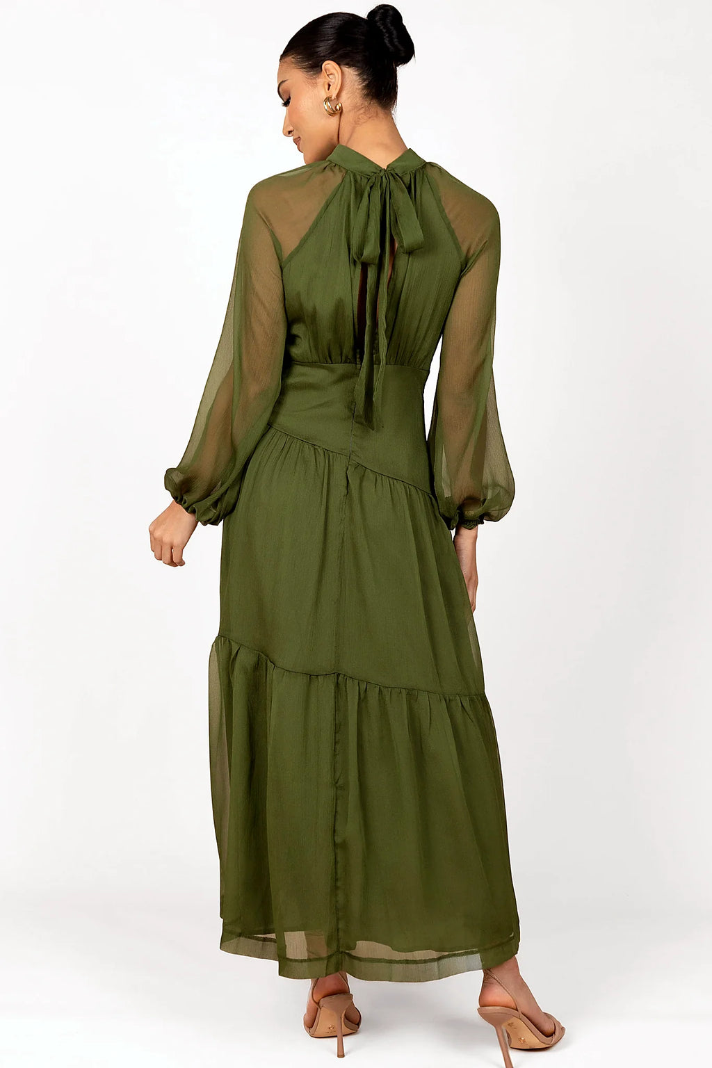 Front view of a olive maxi dress with sheer sleeves, showing the fabric and hem finish