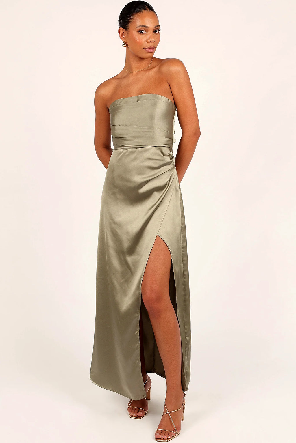 Front view of a black olive strapless maxi dress with split, showing the neckline and bodice detail