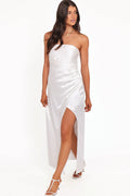 Front view of a white strapless maxi dress, showing the fit and drape of the skirt