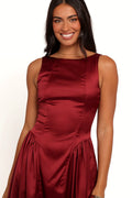 Front view of a red midi dress in deep burgundy, showing the fit and drape of the skirt