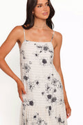 Front view of a black black & ivory floral maxi dress, showing the neckline and bodice detail