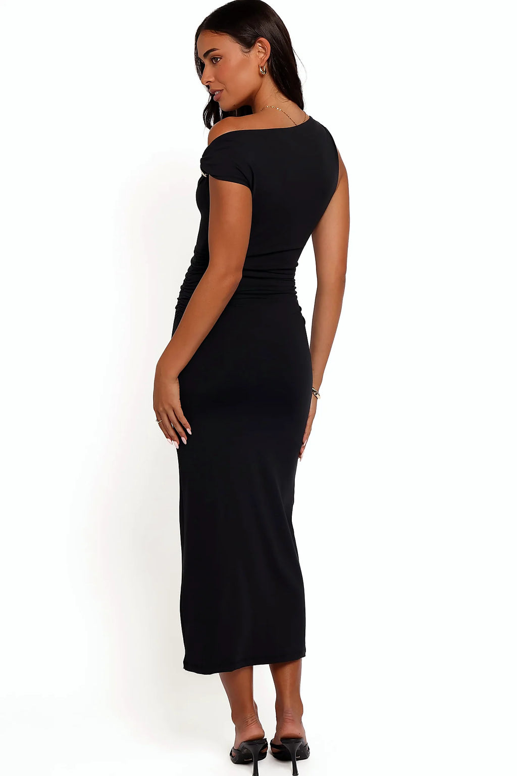Close-up detail of a black off shoulder midi dress, showing the fit and drape of the skirt