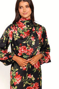 Front view of a black black floral midi dress, open back, showing the fabric and hem finish