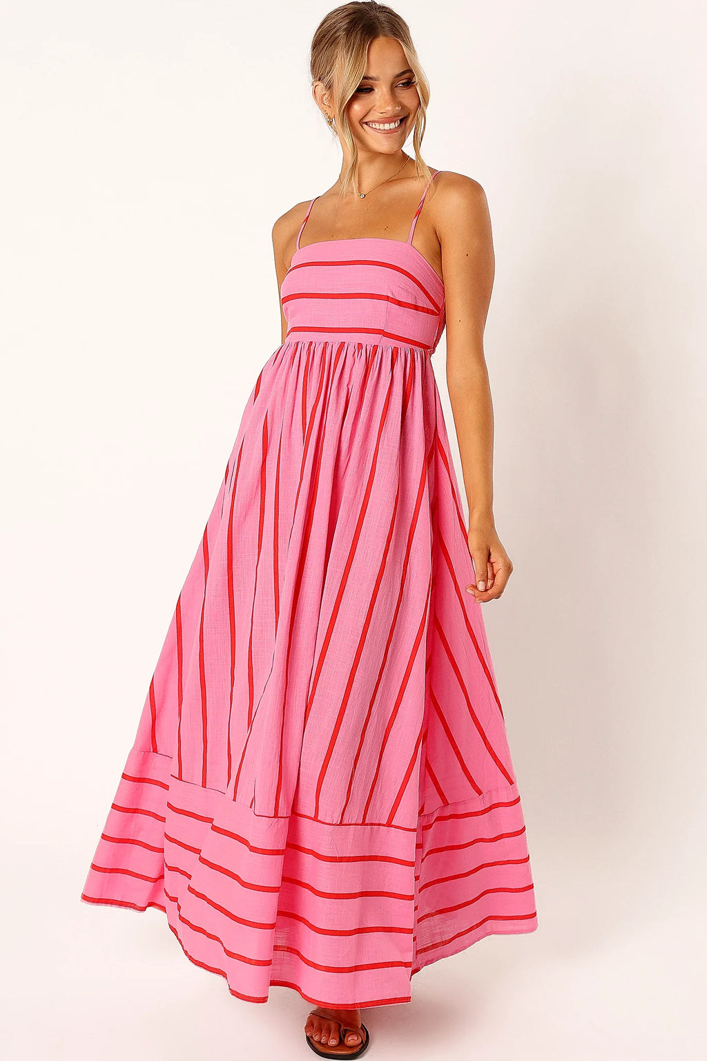 Striped maxi dress packed for a warm weather holiday