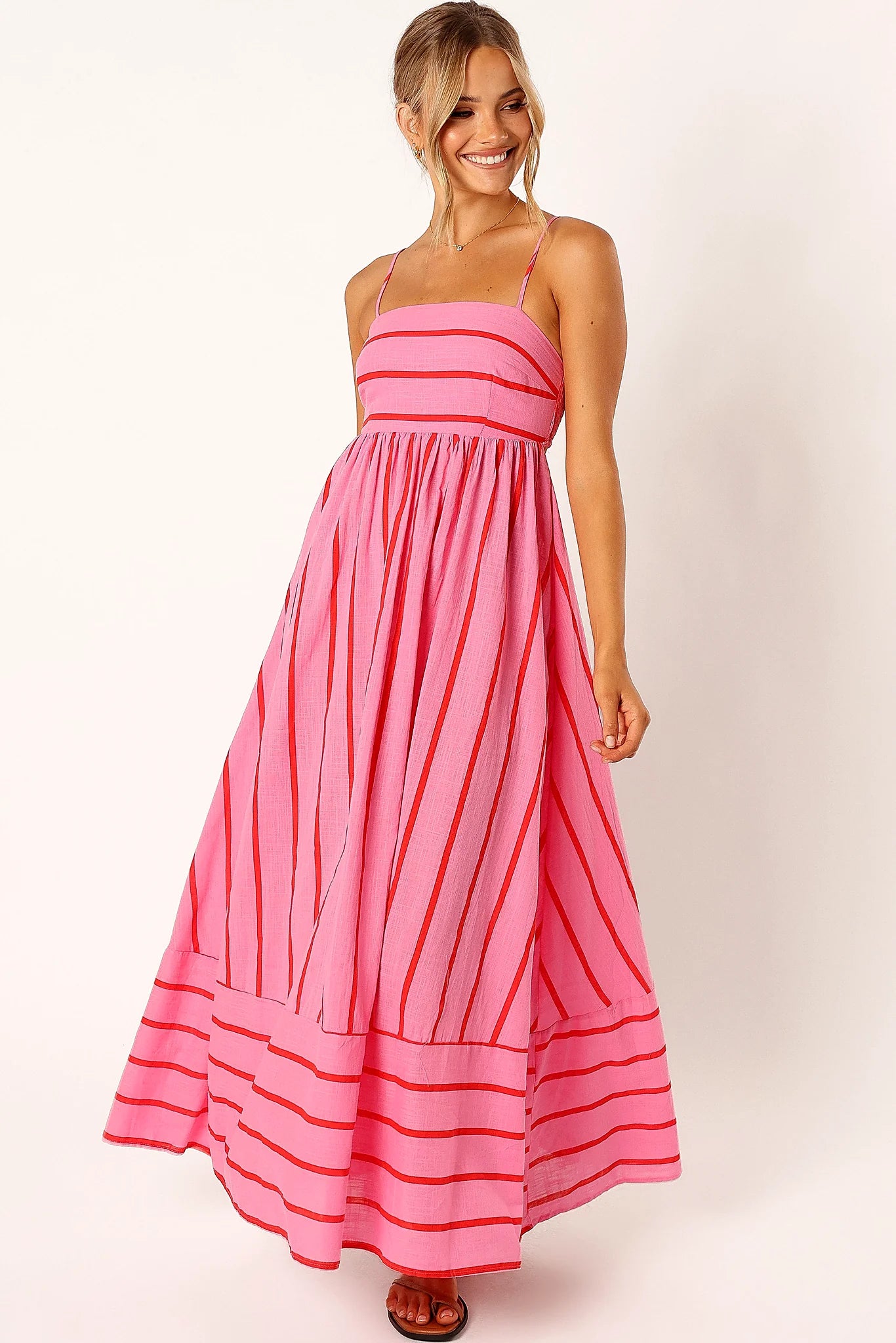Striped maxi dress packed for a warm weather holiday