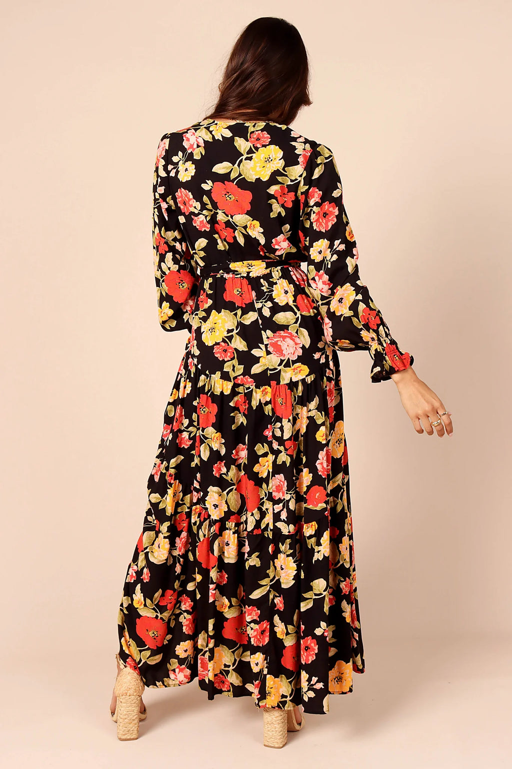 Detachable waist tie threaded through belt loops on a maxi dress
