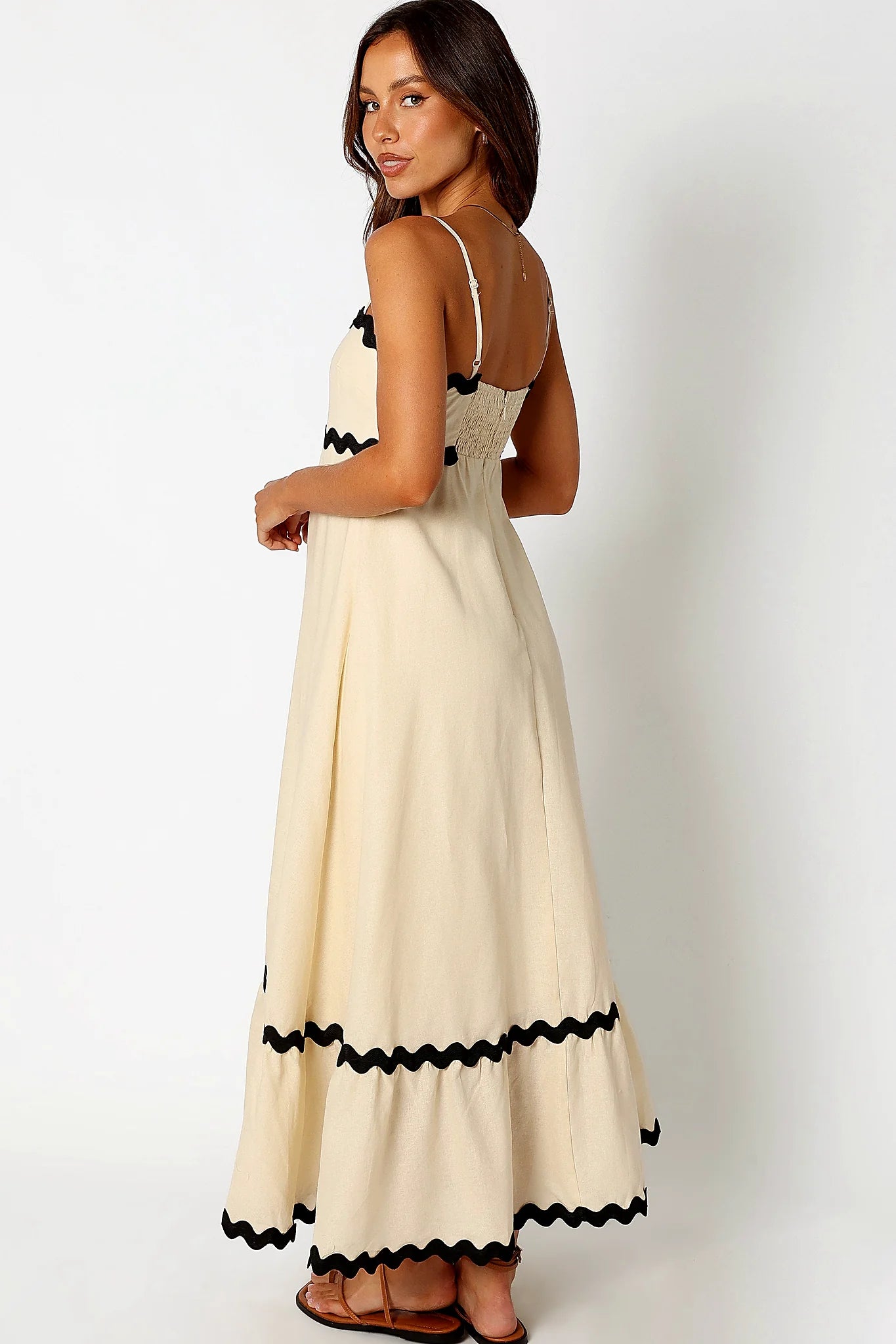 Shirred back panel above an invisible zip in cream and black