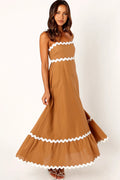 Front view of a white tan & white maxi dress, thin straps, showing the neckline and bodice detail