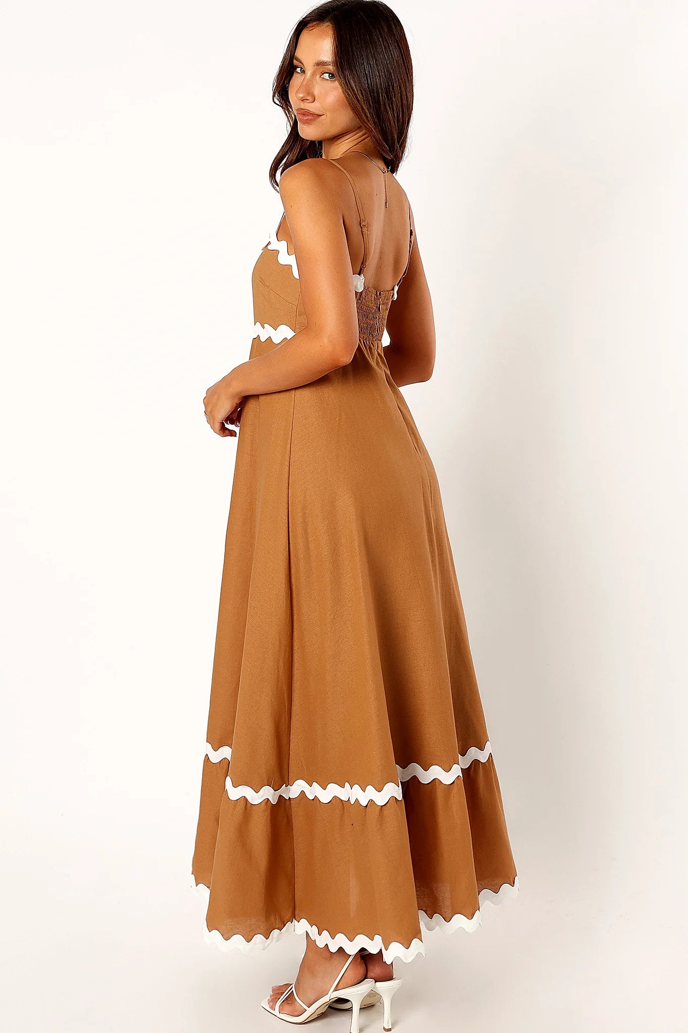 Relaxed maxi dress worn with flat sandals for a casual day